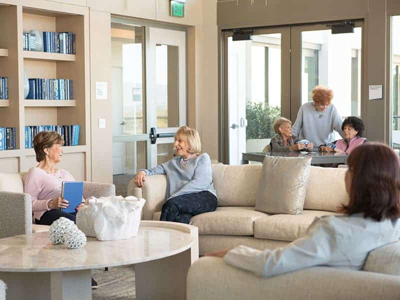 Women enjoying lounge area.